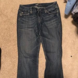 Mid rise, dark wash, boot cut, Miss Me jeans!